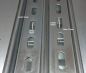 Preview: 1m Tragschiene flach 35x7,5 mm BxH verzinkt gelocht - 18x6,2mm