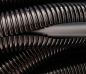 Preview: NW29 Wellrohr PA6 flex Kabelschutz schwarz - geschlitzt